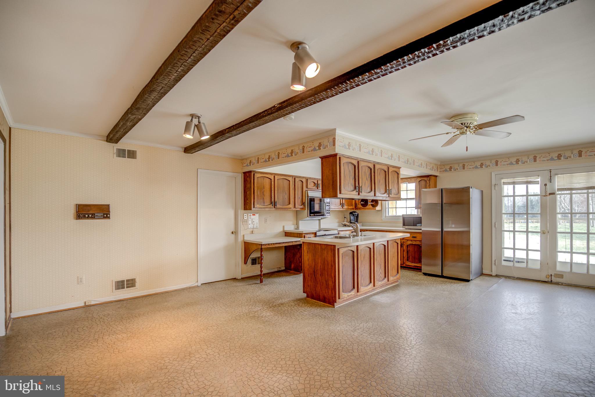 11809 Stuart Mill Road Oakton, VA 22124 - Photo 50 of 76 Family Room to Kitchen