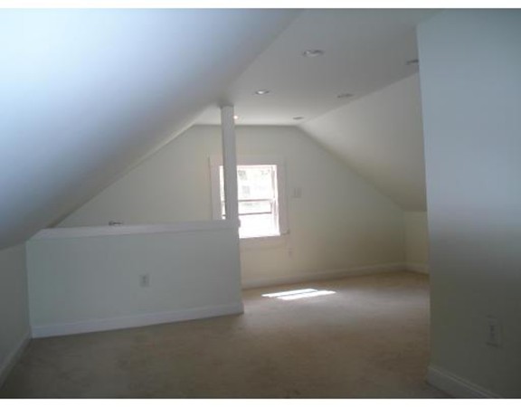 383 Marrett Road Lexington, MA 02421 - Photo 17 of 18 an empty room with windows