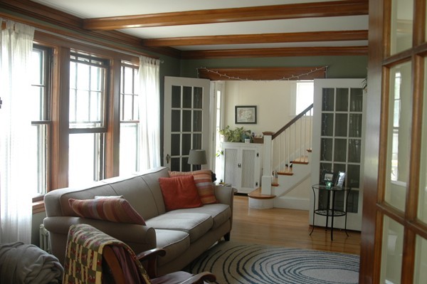 383 Marrett Road Lexington, MA 02421 - Photo 7 of 18 a living room with furniture and a large window