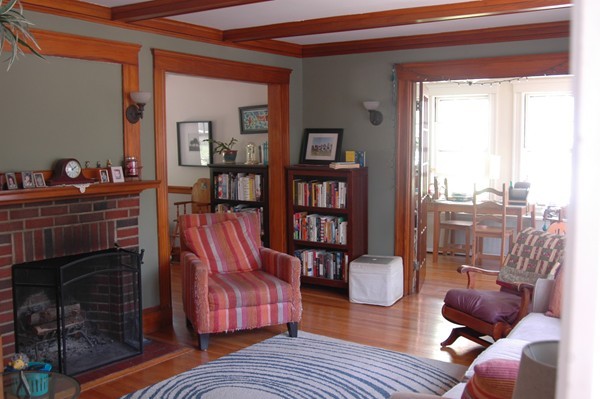 383 Marrett Road Lexington, MA 02421 - Photo 9 of 18 a living room with furniture and a book shelf