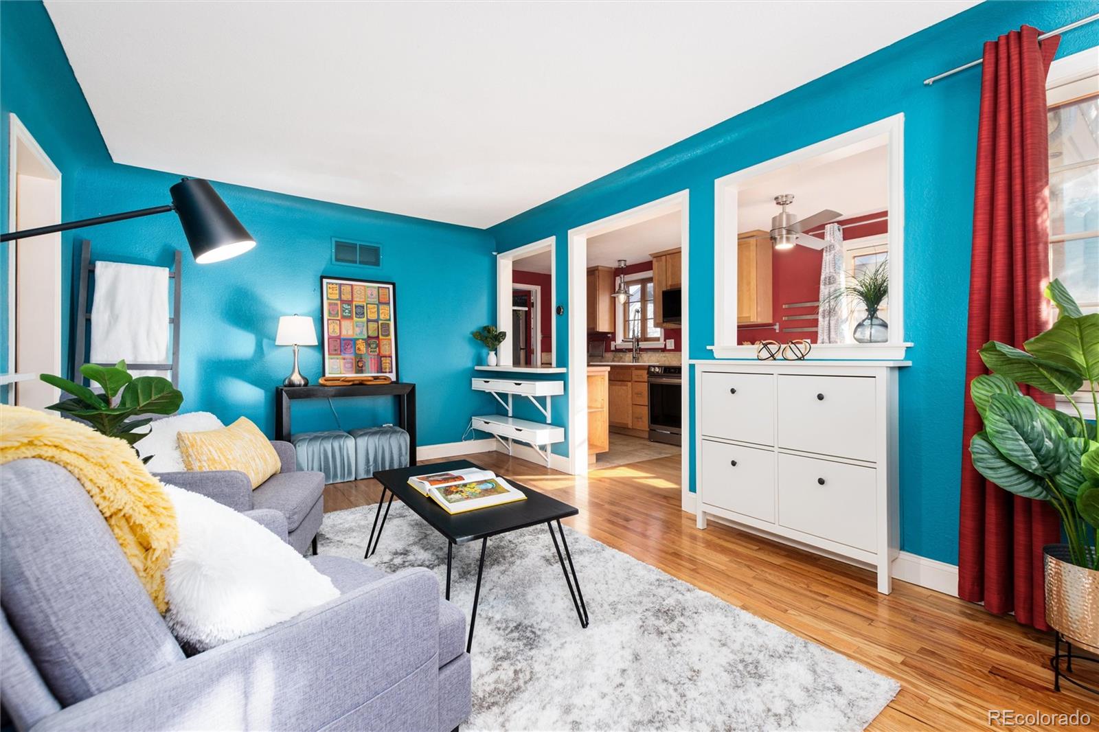 3100 Ames Street Wheat Ridge, CO 80214 - Photo 11 of 39 a living room with furniture a rug and a window