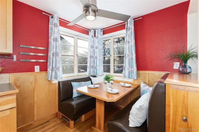a view of a dining room with furniture window and outside view