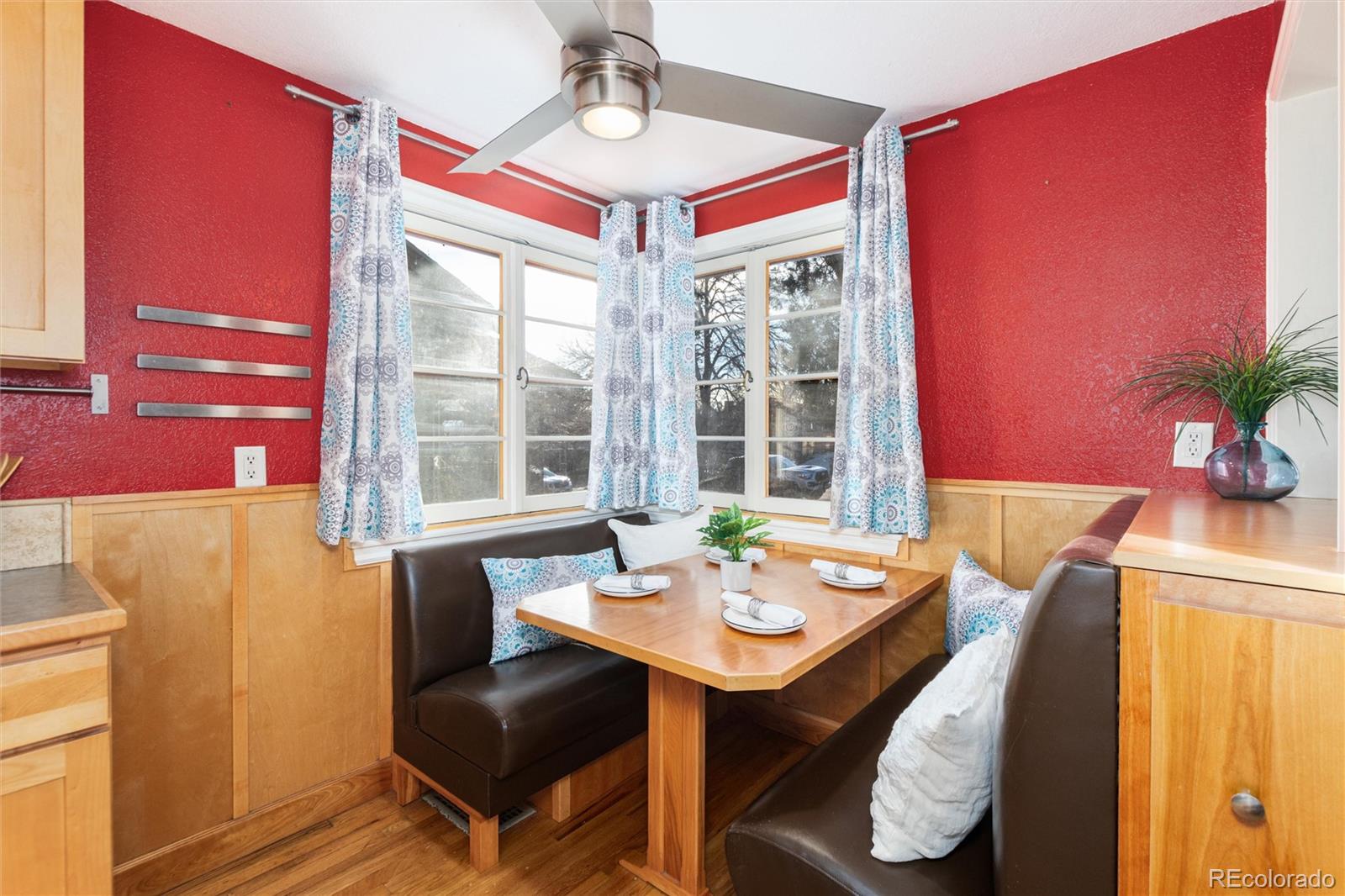 3100 Ames Street Wheat Ridge, CO 80214 - Photo 12 of 39 a view of a dining room with furniture window and outside view