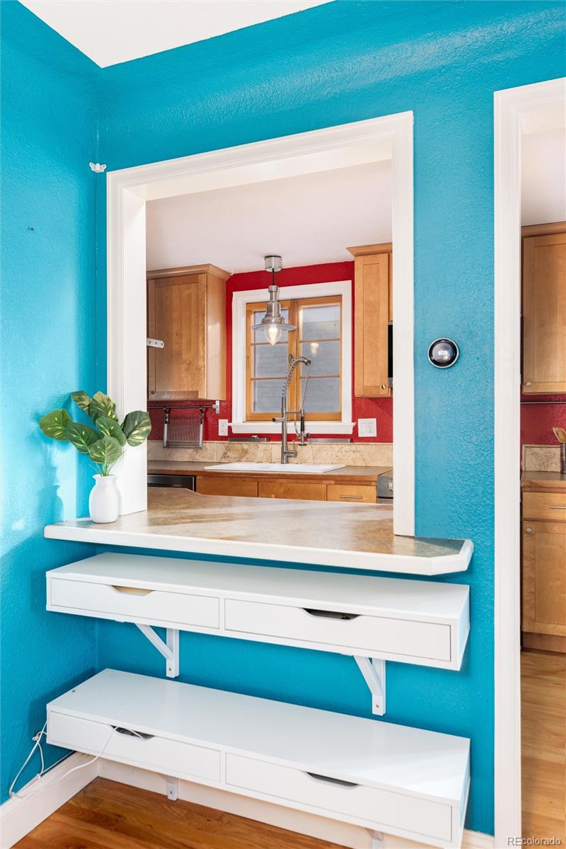 3100 Ames Street Wheat Ridge, CO 80214 - Photo 20 of 39 a bathroom with a sink and a mirror