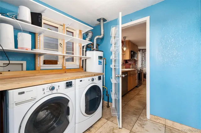 a view of living room with washer and dryer