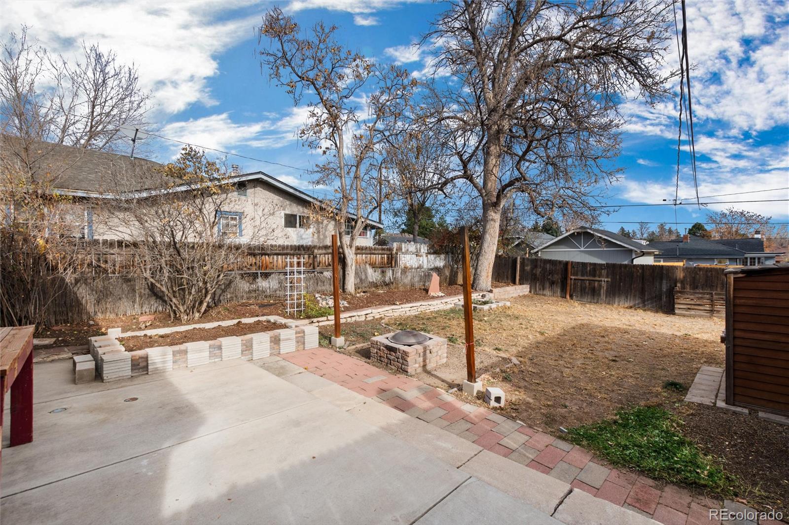 3100 Ames Street Wheat Ridge, CO 80214 - Photo 29 of 39 a view of a house with backyard