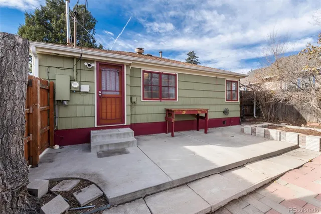 a view of house with outdoor space