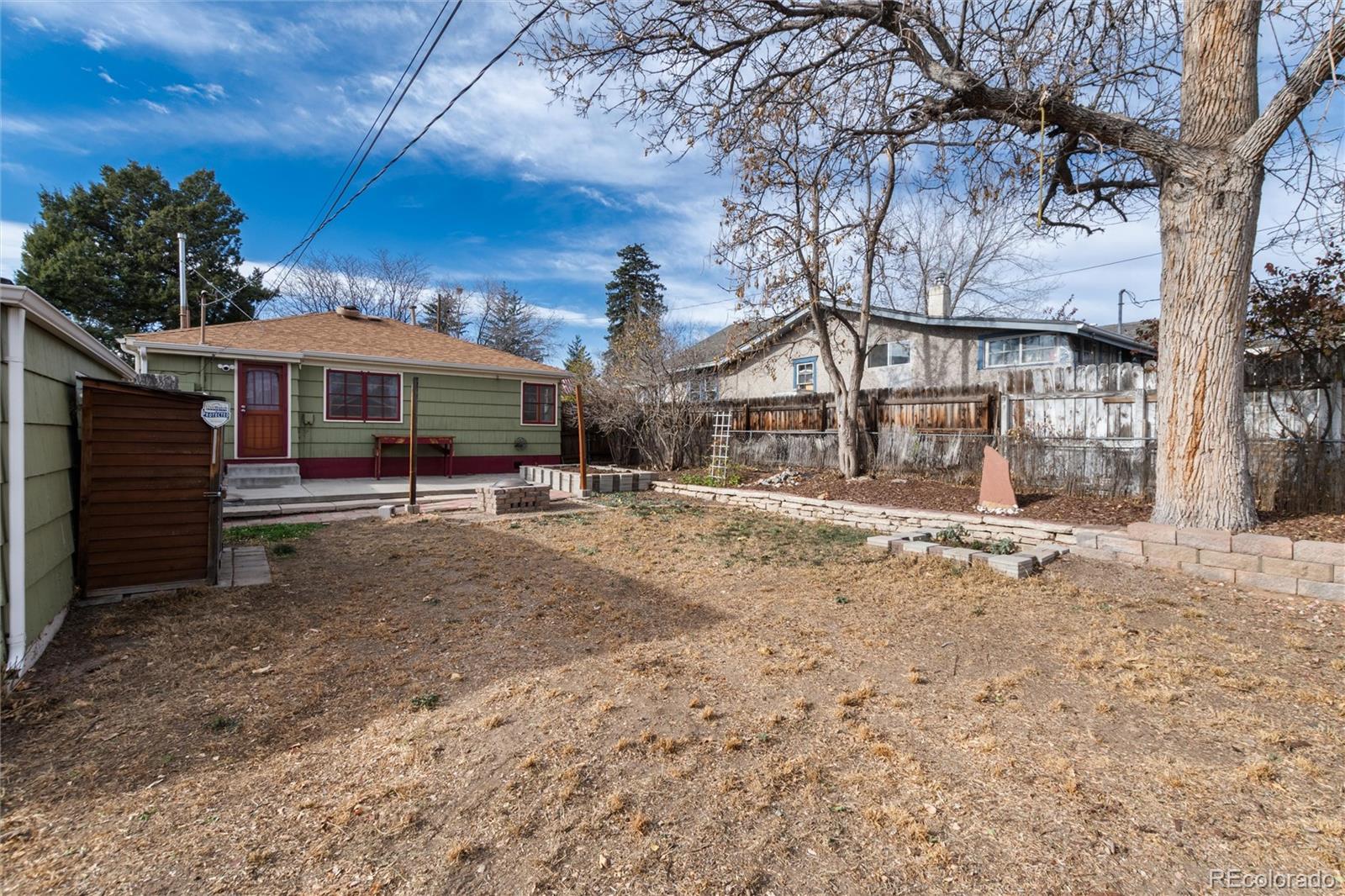 3100 Ames Street Wheat Ridge, CO 80214 - Photo 33 of 39 a view of a town with large trees