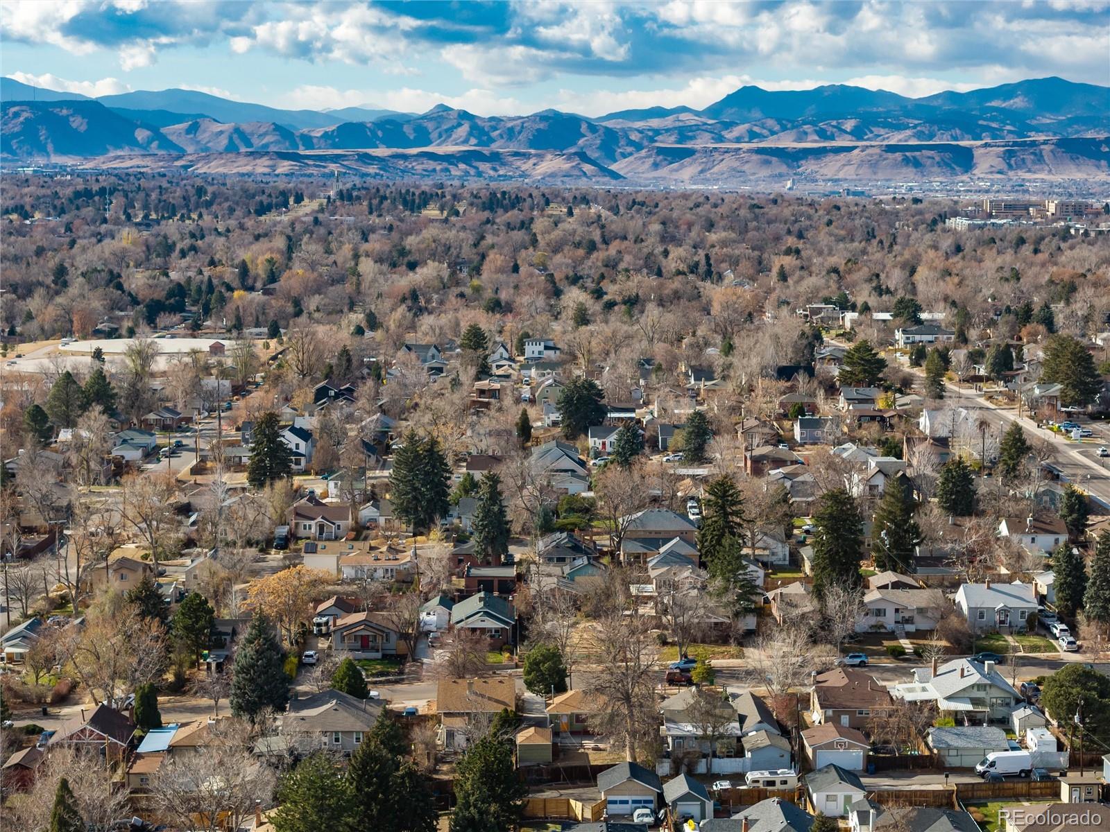 3100 Ames Street Wheat Ridge, CO 80214 - Photo 5 of 39 an aerial view of residential houses with outdoor space
