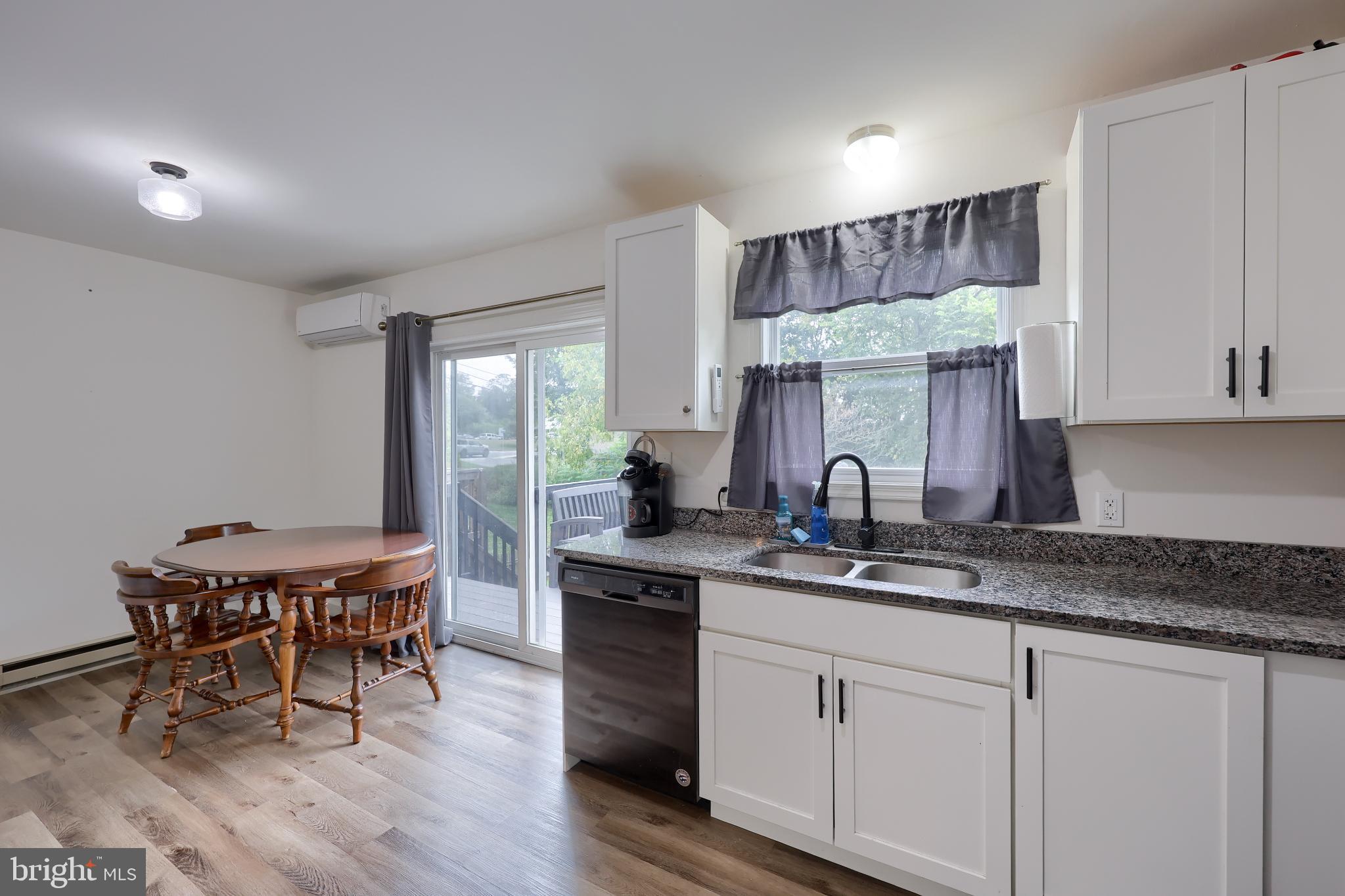425 Cardinal Road Lititz, PA 17543 - Photo 18 of 33 a kitchen with stainless steel appliances granite countertop a sink and cabinets