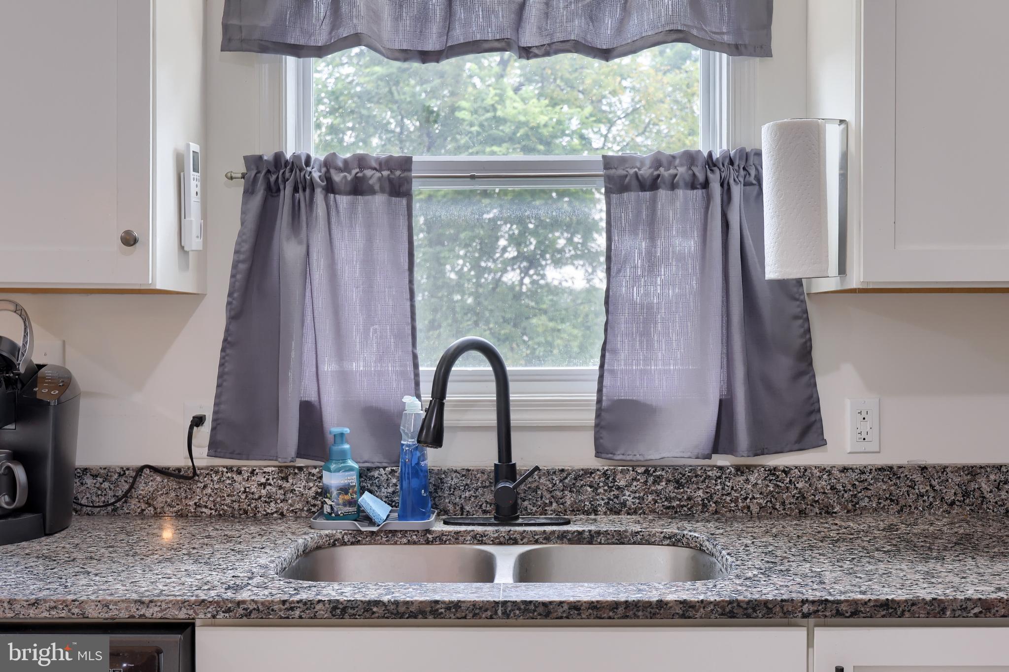 425 Cardinal Road Lititz, PA 17543 - Photo 19 of 33 a bathroom with a granite countertop sink and a mirror