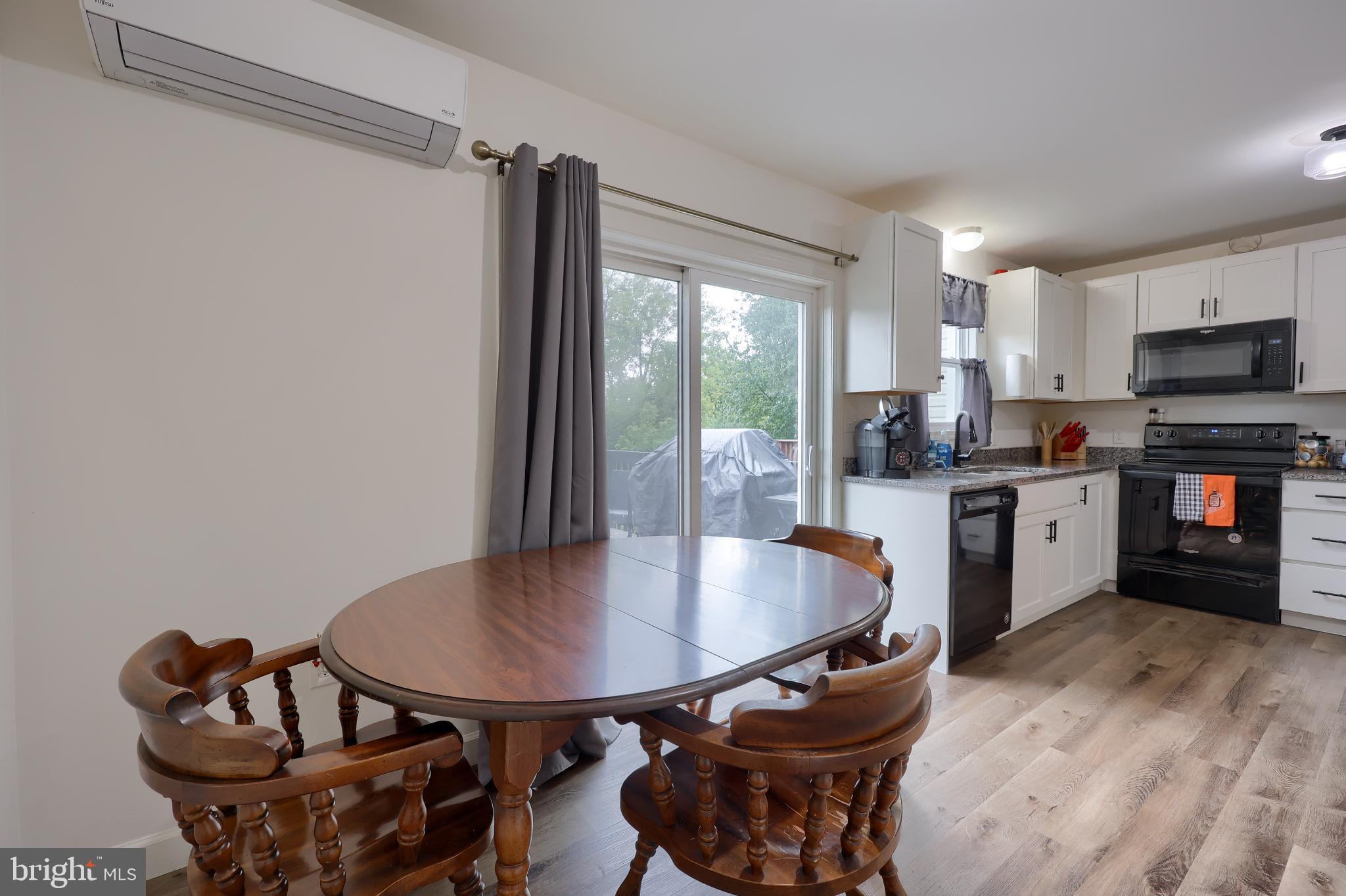 425 Cardinal Road Lititz, PA 17543 - Photo 21 of 33 a kitchen with stainless steel appliances a table and chairs