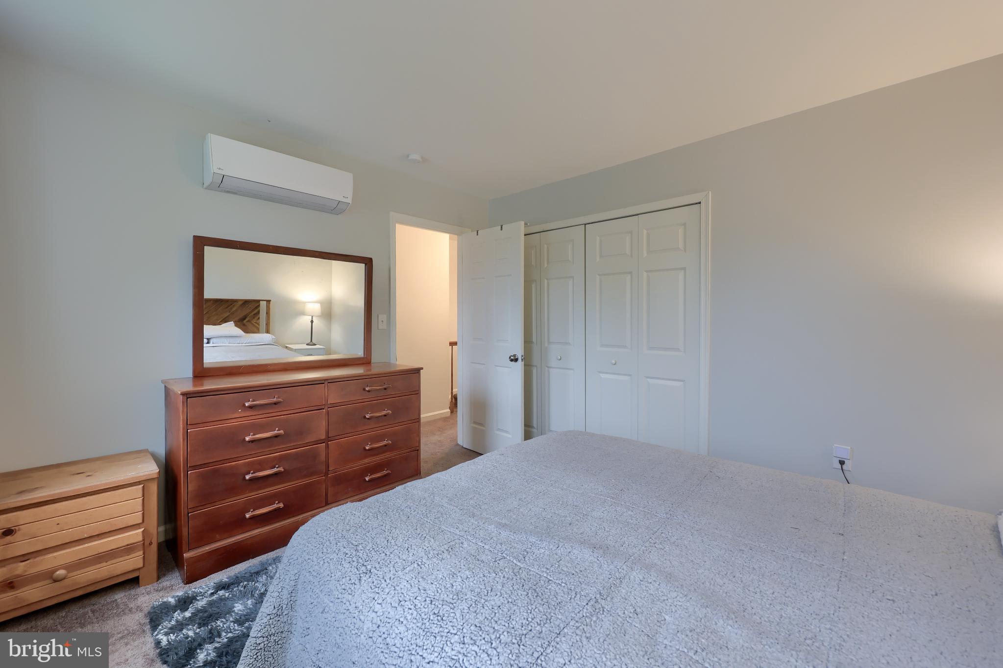 425 Cardinal Road Lititz, PA 17543 - Photo 27 of 33 a bedroom with a bed and a mirror on dresser