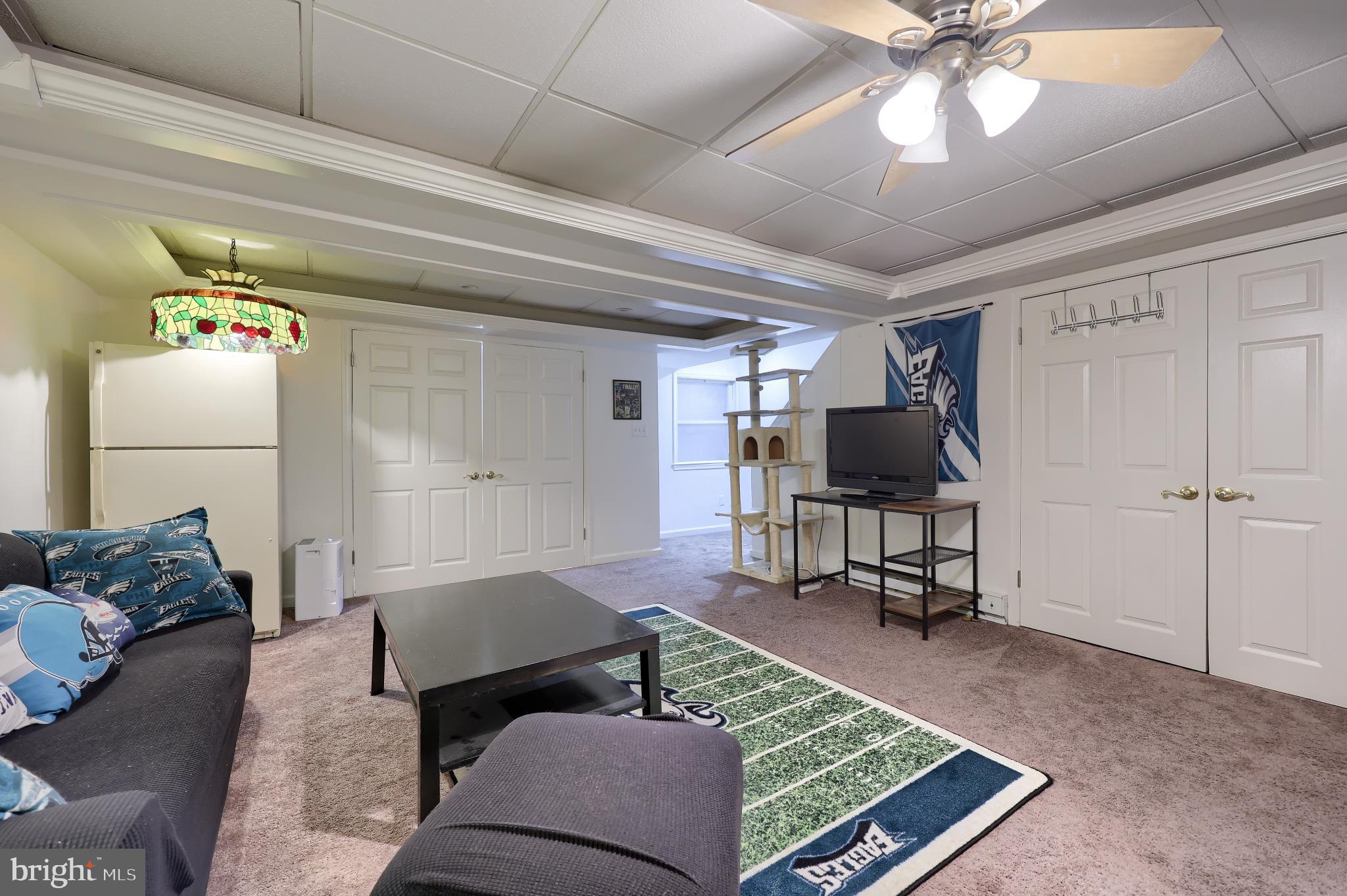 425 Cardinal Road Lititz, PA 17543 - Photo 33 of 33 a living room with furniture and a flat screen tv