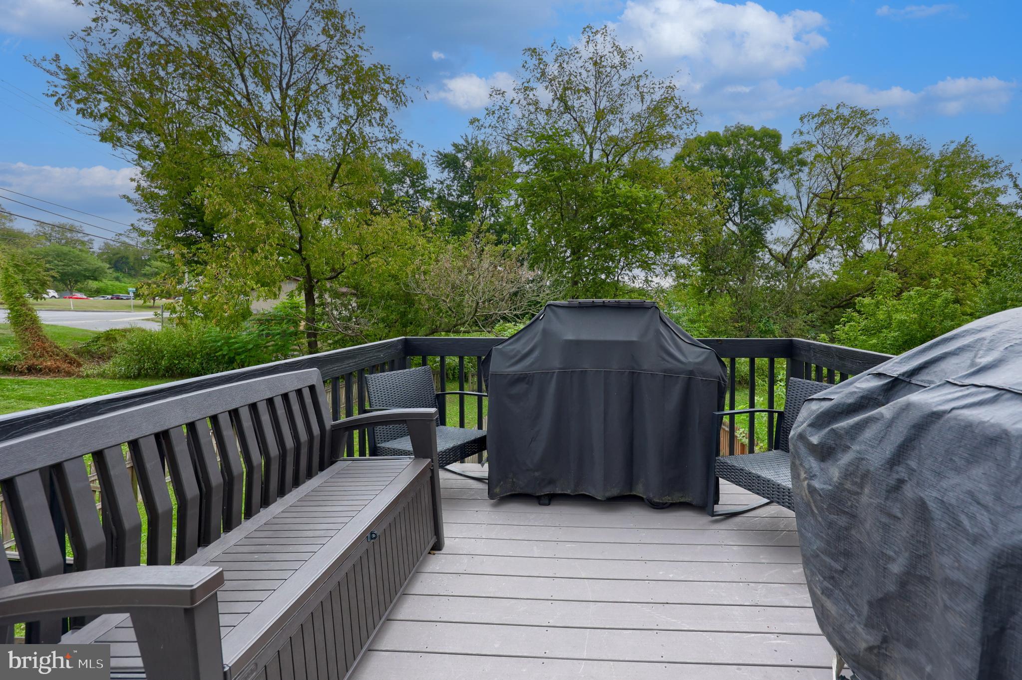 425 Cardinal Road Lititz, PA 17543 - Photo 6 of 33 a view of a wooden deck and a backyard