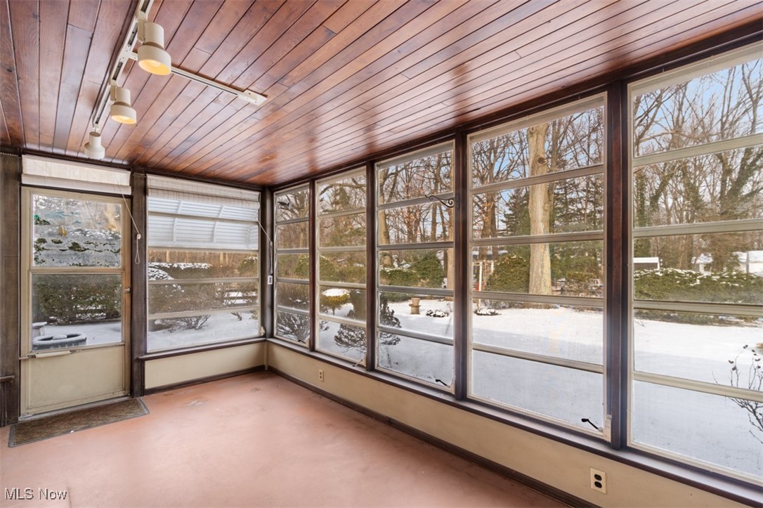 3609 Brinkmore Road Cleveland, OH 44121 - Photo 11 of 50 sunroom with track lighting and wood ceiling