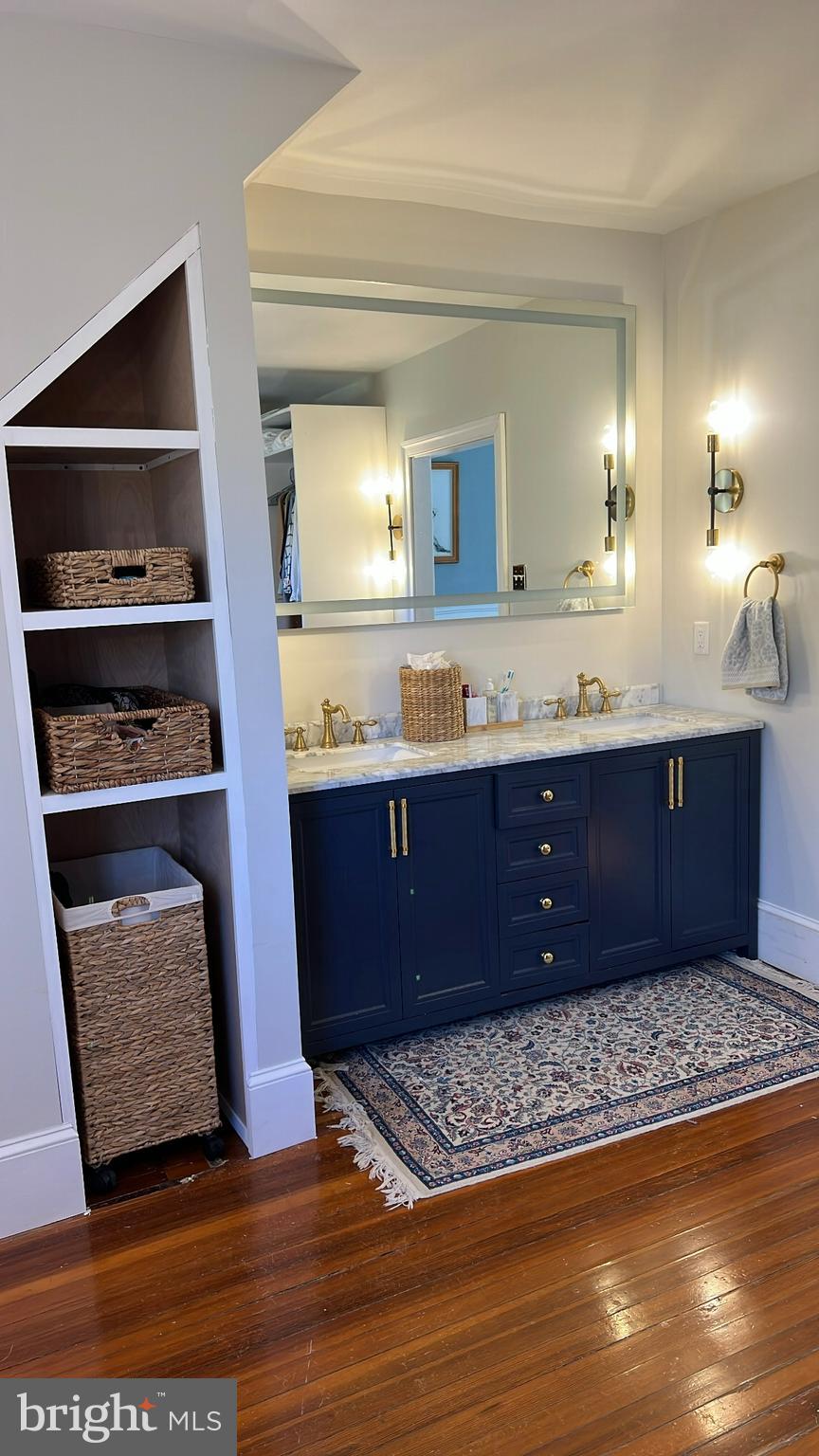731 Yale Avenue Swarthmore, PA 19081 - Photo 25 of 35 a bathroom with a sink a vanity and a mirror