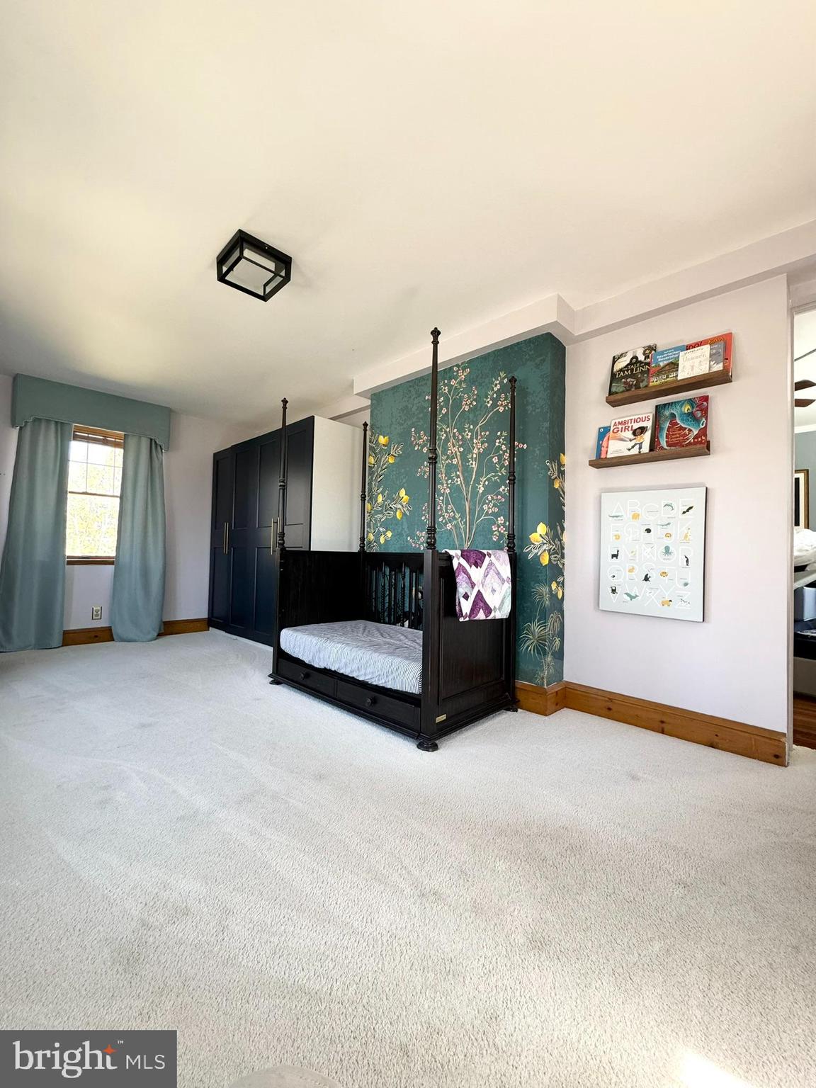 731 Yale Avenue Swarthmore, PA 19081 - Photo 26 of 35 a living room with furniture and a window