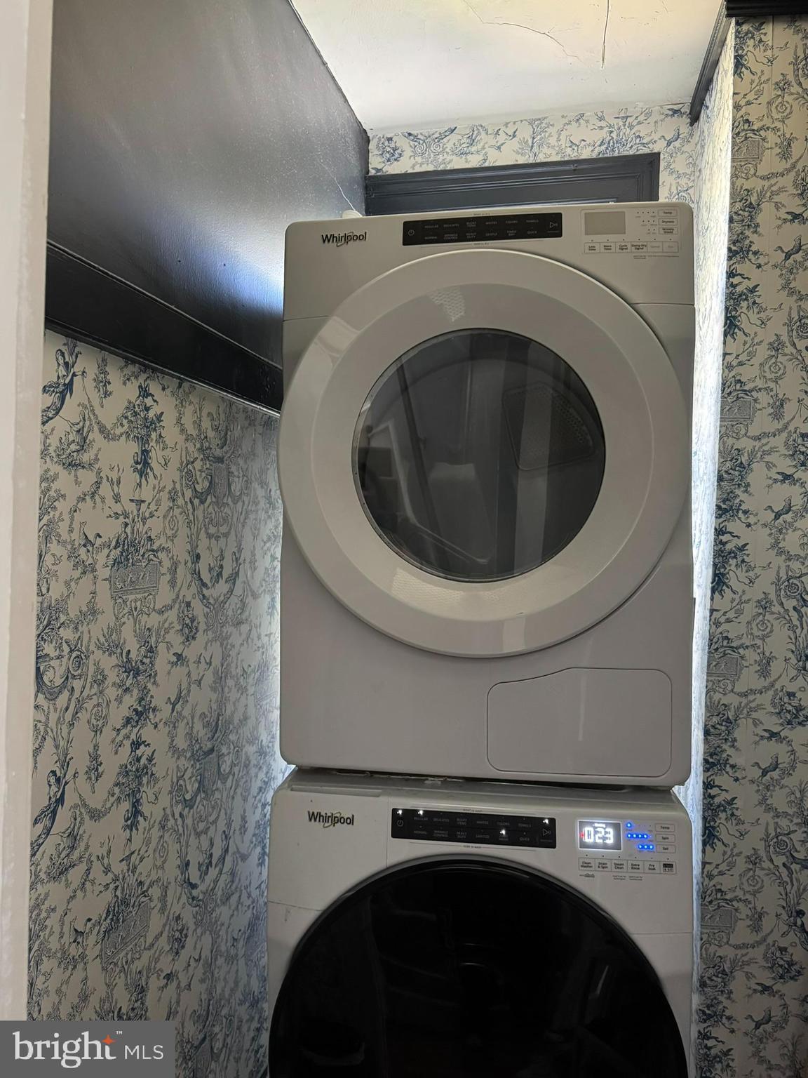 731 Yale Avenue Swarthmore, PA 19081 - Photo 29 of 35 a utility room with dryer and washer