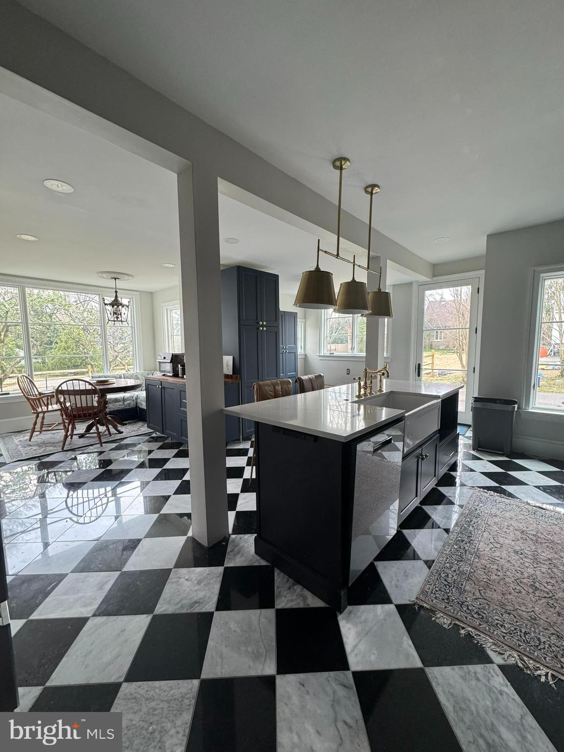 731 Yale Avenue Swarthmore, PA 19081 - Photo 7 of 35 a kitchen with a dining table and chairs