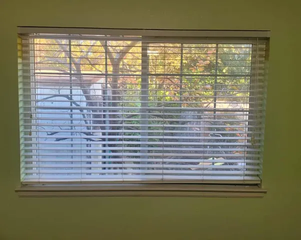 a view of a room that has a window