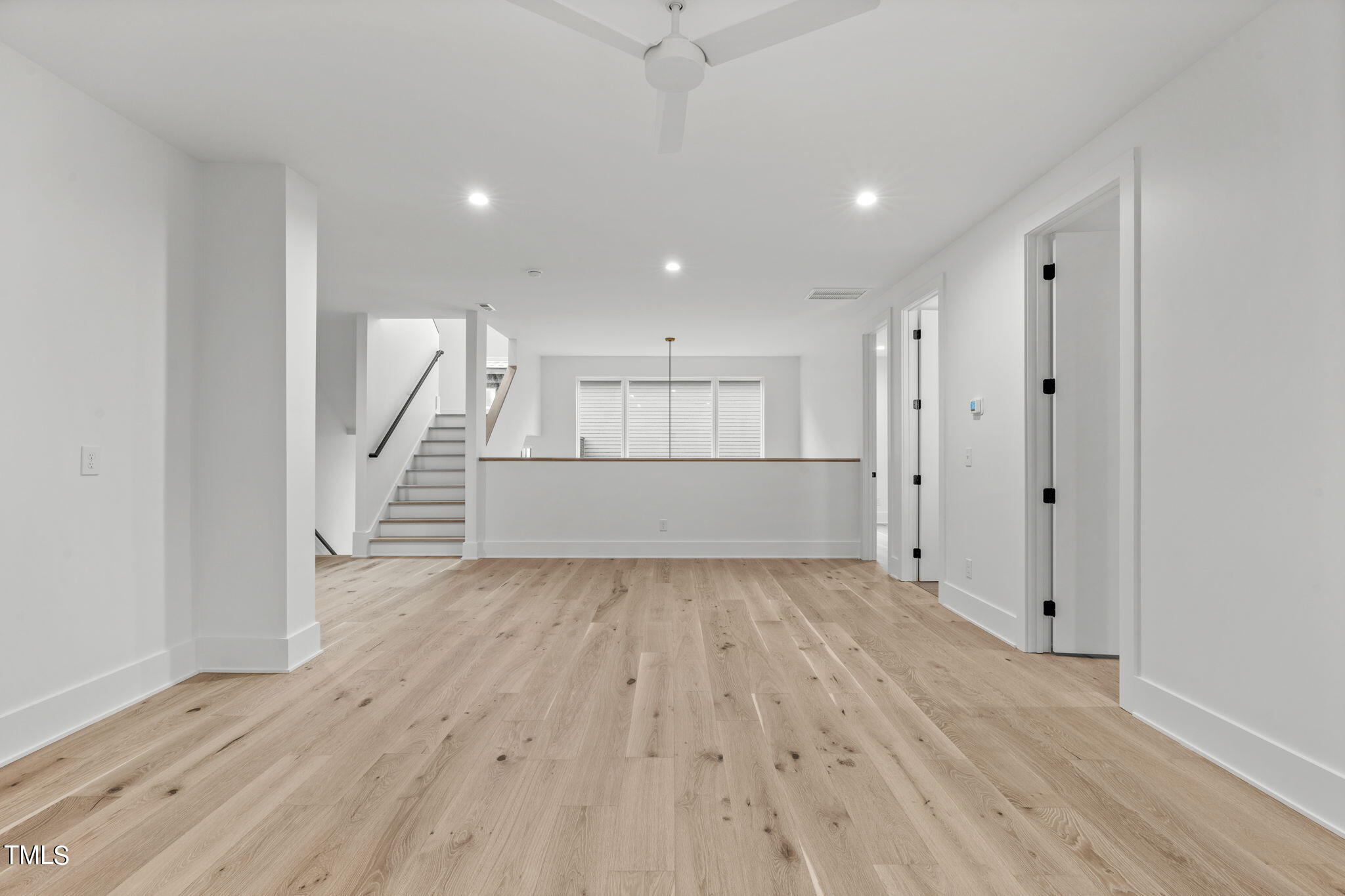 1406 Lyon Street, Unit 102 Raleigh, NC 27608 - Photo 17 of 57 a view of entryway with wooden floor