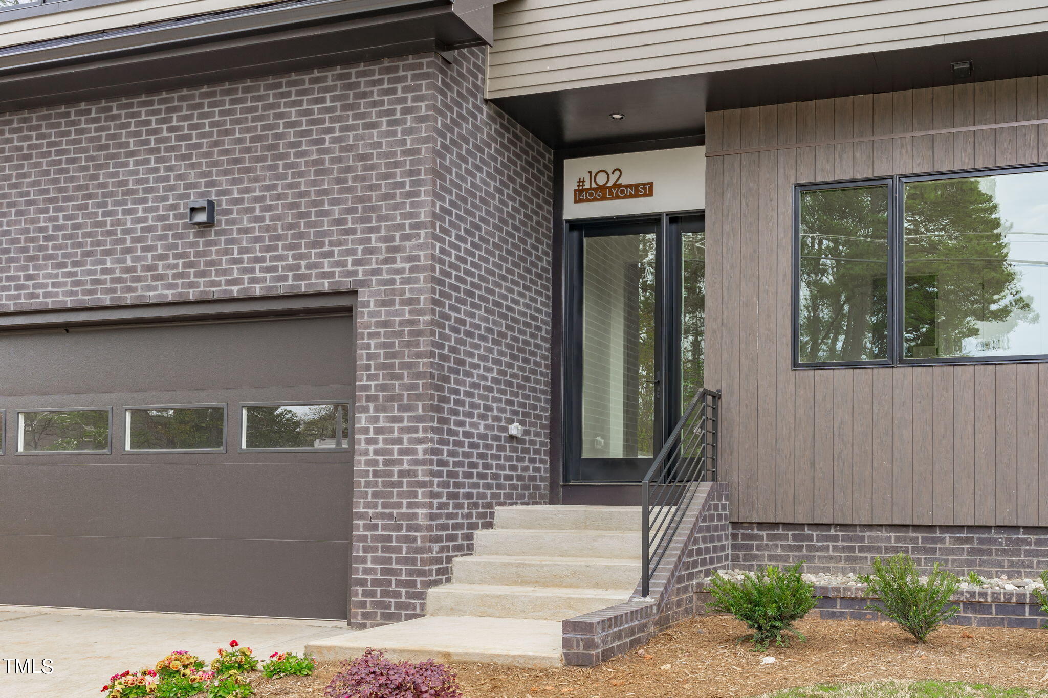 1406 Lyon Street, Unit 102 Raleigh, NC 27608 - Photo 40 of 57 a front view of a house