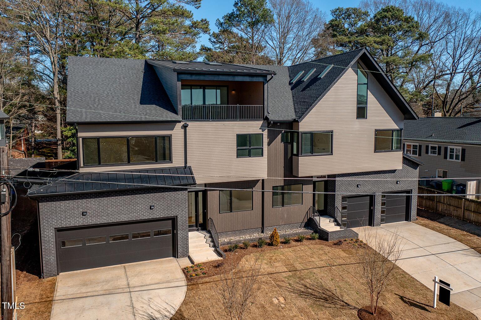 1406 Lyon Street, Unit 102 Raleigh, NC 27608 - Photo 44 of 57 a house view with a outdoor space