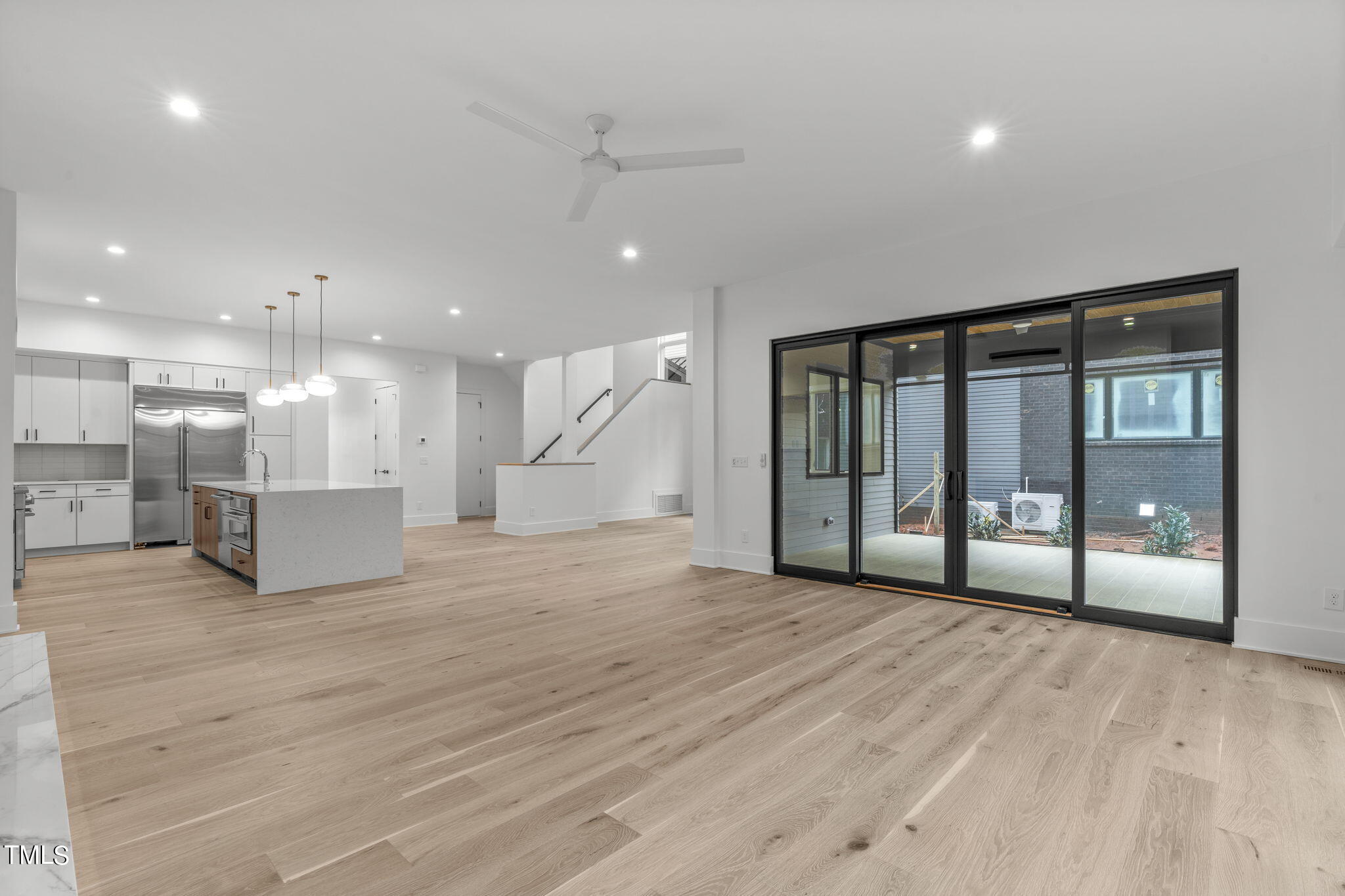 1406 Lyon Street, Unit 102 Raleigh, NC 27608 - Photo 8 of 57 a view of an empty room with a window