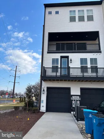 a front view of a house with a balcony