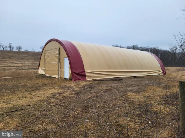 a view of swimming pool with a yard