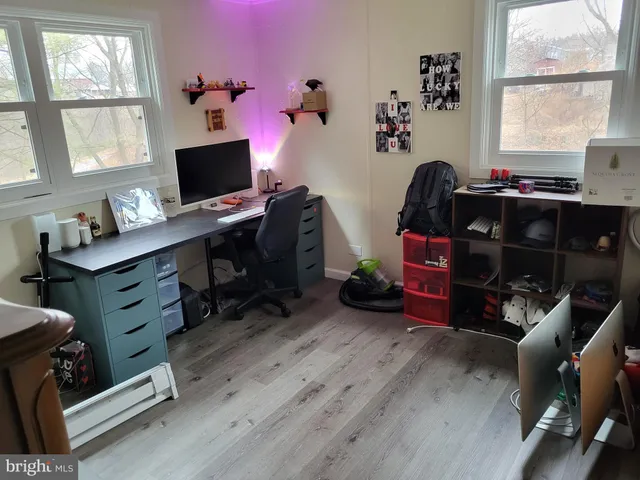 a room with furniture and a window