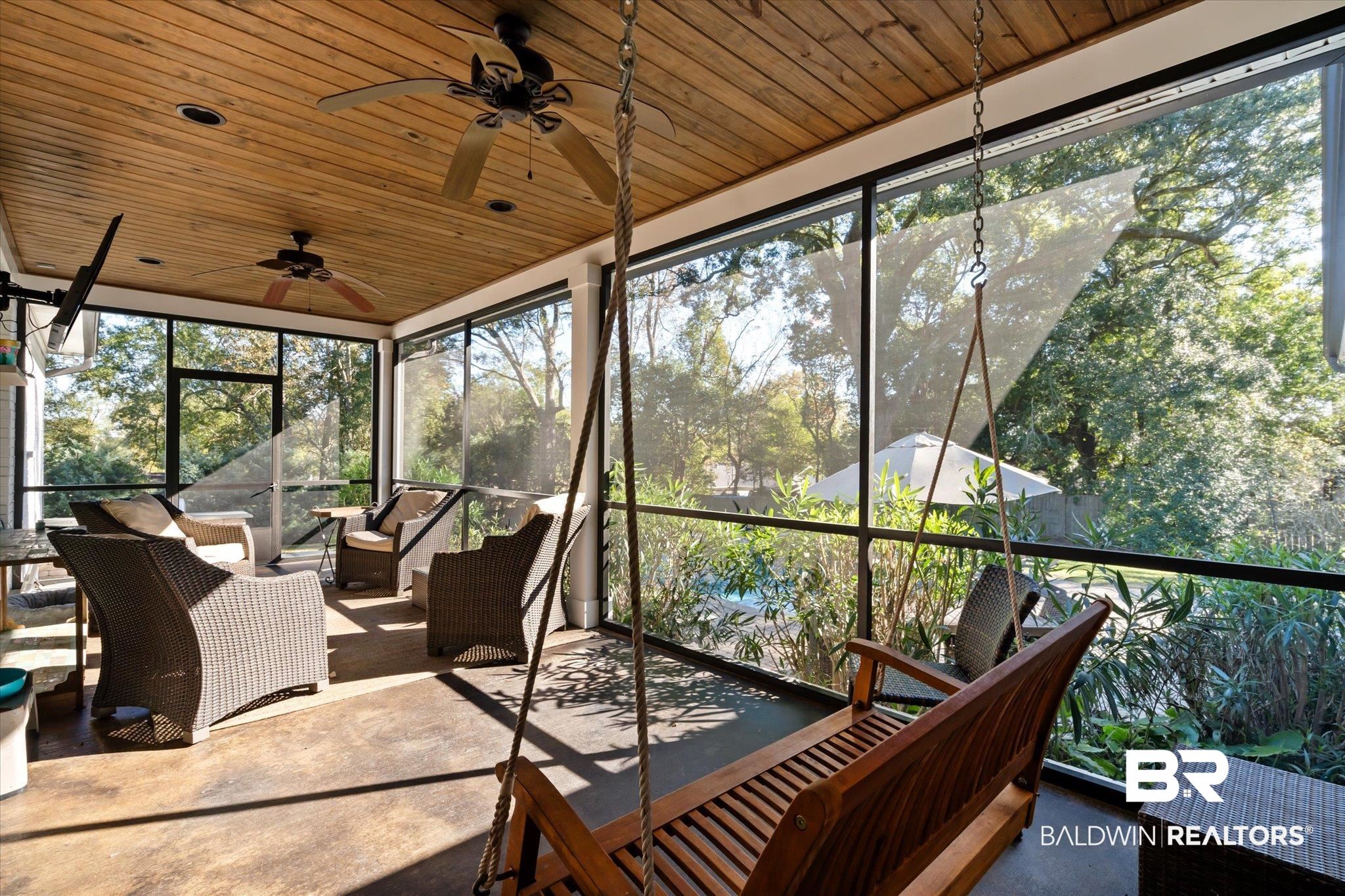 3713 Old Shell Road Mobile, AL 36608 - Photo 17 of 52 Sunroom featuring ceiling fan and wooden ceiling