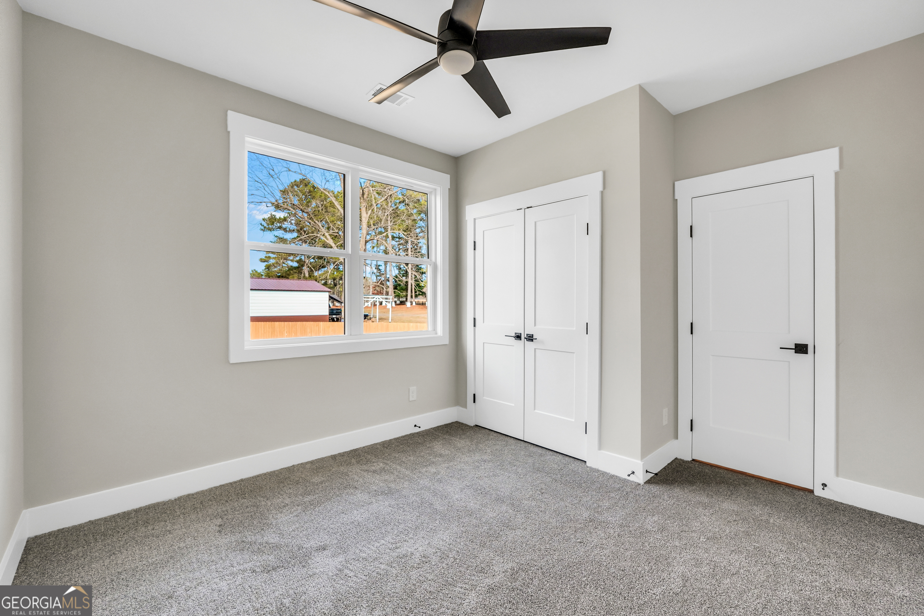 277 East Knight Road McDonough, GA 30252 - Photo 14 of 23 a view of an empty room with a window
