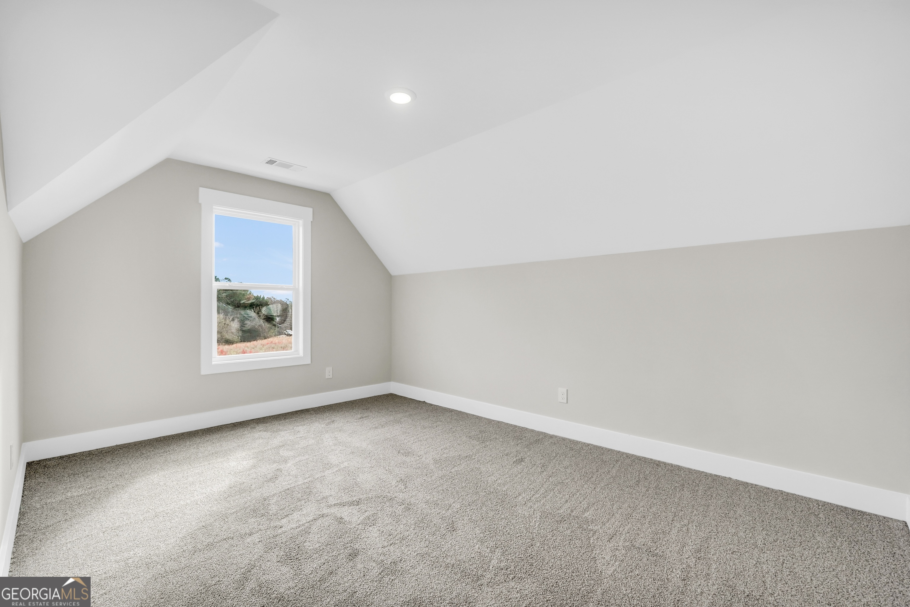 277 East Knight Road McDonough, GA 30252 - Photo 20 of 23 an empty room with a window
