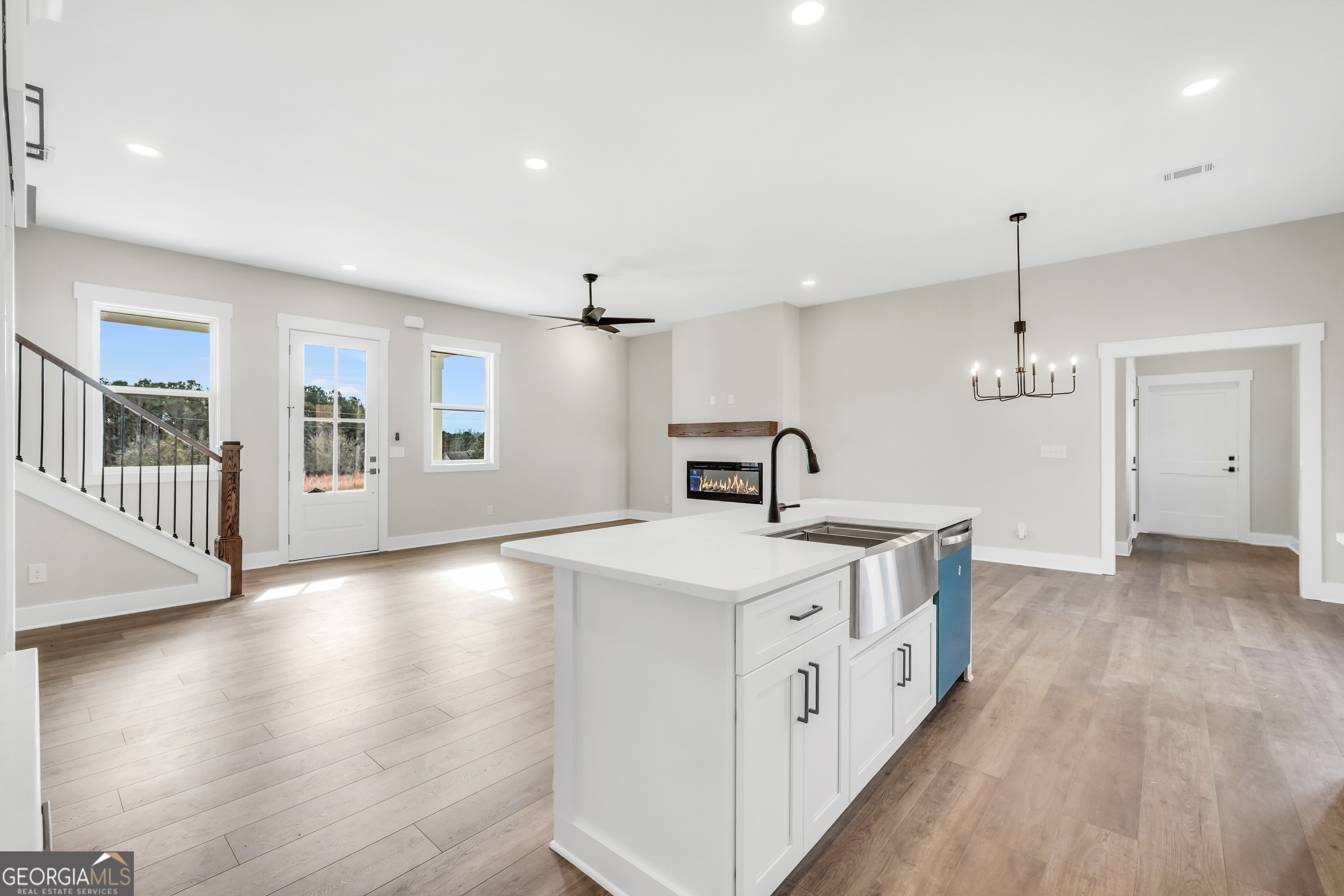 277 East Knight Road McDonough, GA 30252 - Photo 5 of 23 an open kitchen with a sink and dish washer