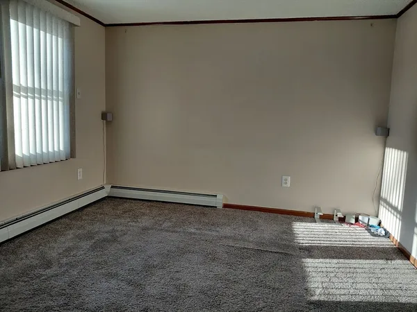 a view of an empty room with window