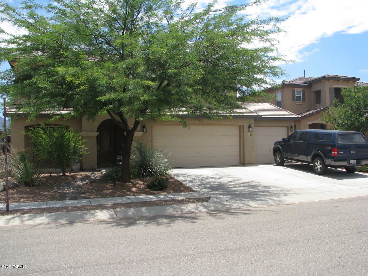 3728 East Mecate Road Tucson, AZ 85739 - Photo 1 of 9 a house view with a outdoor space