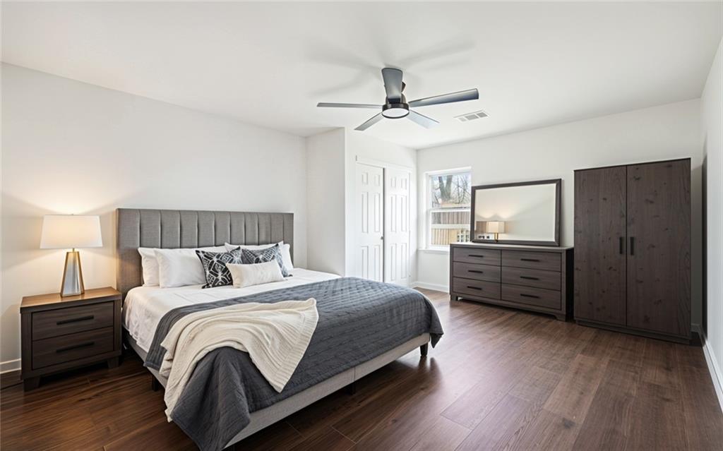 1 Lamar Avenue Southwest Atlanta, GA 30310 - Photo 7 of 11 a bedroom with a bed and wooden floor