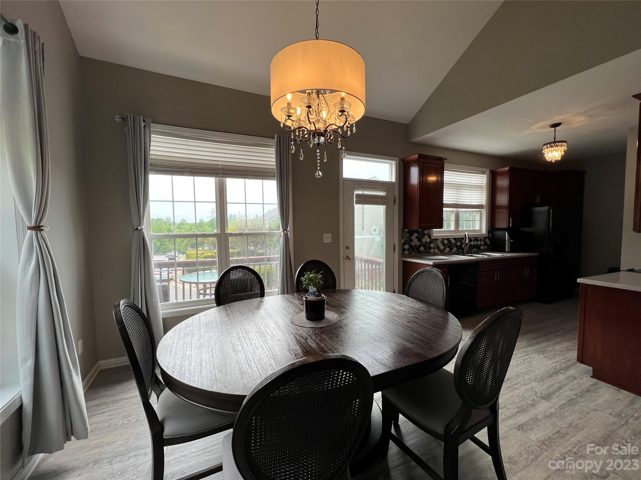 117 Forest Ridge Road Mooresville, NC 28117 - Photo 15 of 40 a view of a dining room with furniture window and outside view