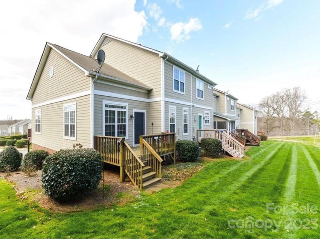 117 Forest Ridge Road Mooresville, NC 28117 - Photo 22 of 40 a view of a house with a yard and sitting area