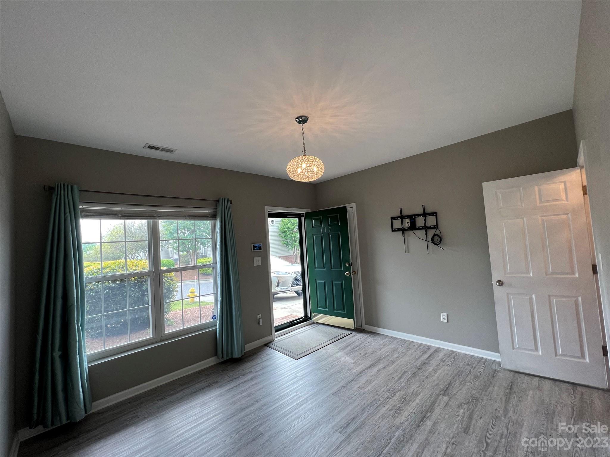 117 Forest Ridge Road Mooresville, NC 28117 - Photo 35 of 40 wooden floor in an empty room with a window