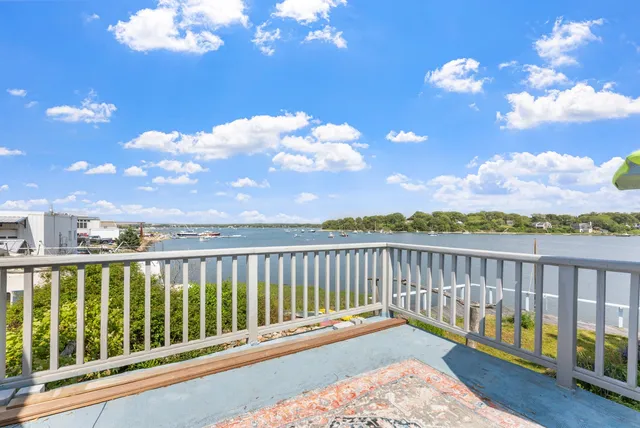 a view of a lake with a city