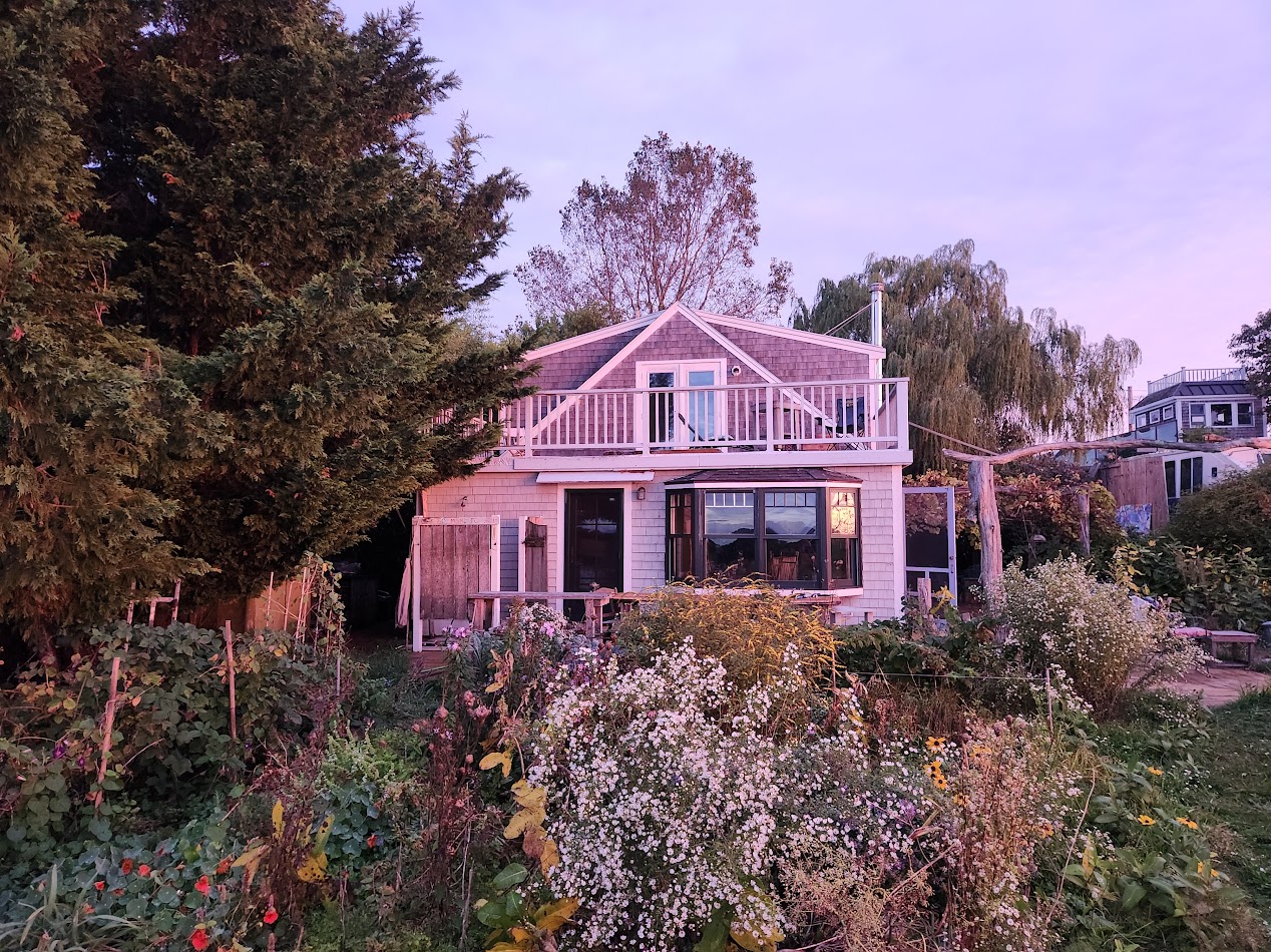 129 Beach Road Vineyard Haven, MA 02568 - Photo 13 of 71 a front view of a house with a yard