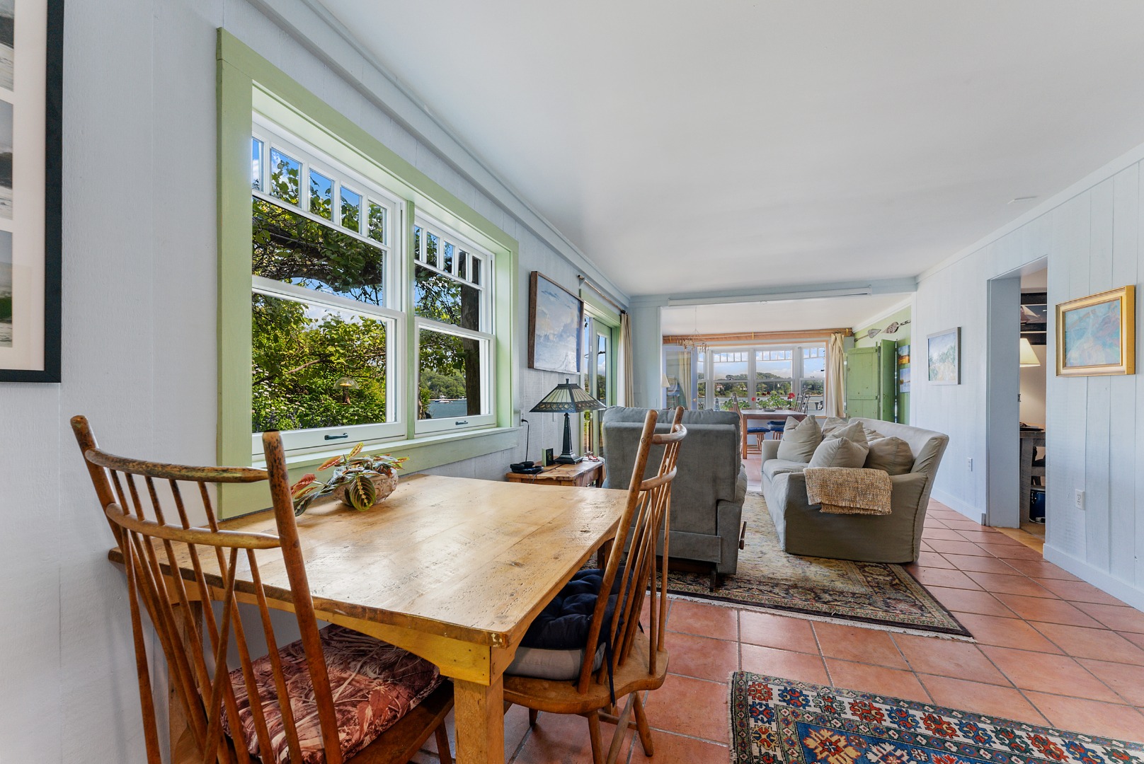 129 Beach Road Vineyard Haven, MA 02568 - Photo 18 of 71 a dining room with furniture a rug and a large window