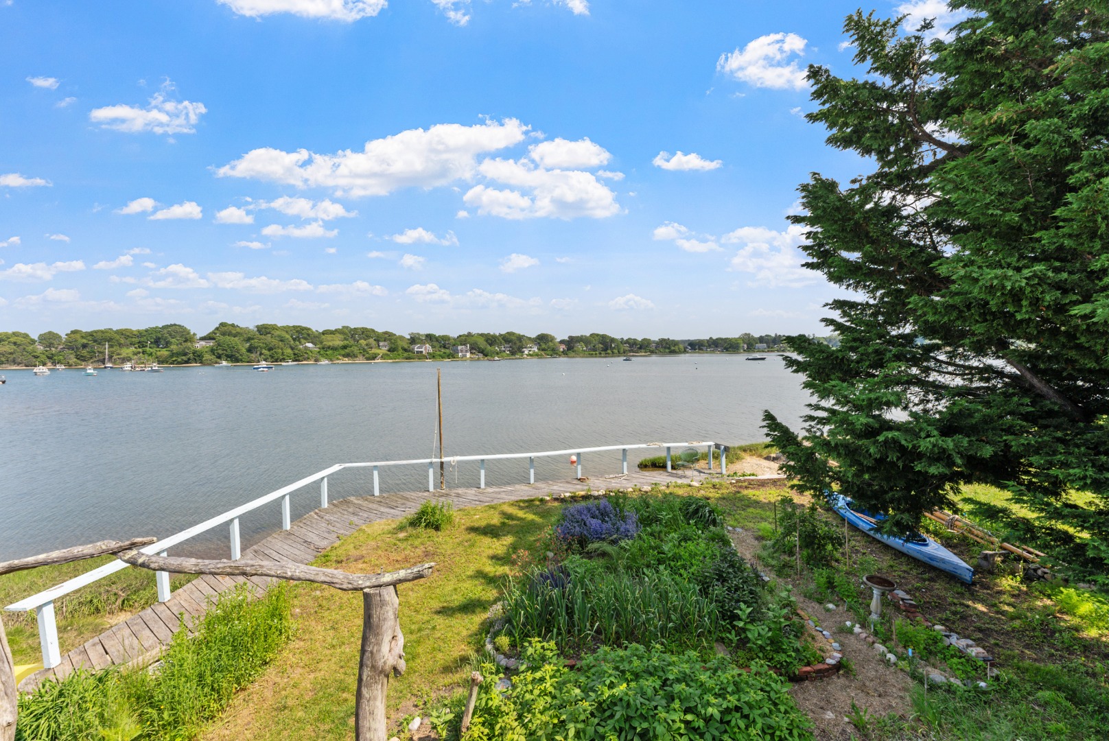 129 Beach Road Vineyard Haven, MA 02568 - Photo 2 of 71 a view of a lake with a city