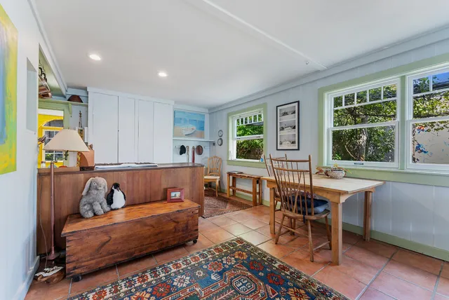 a bedroom with a bed and dresser