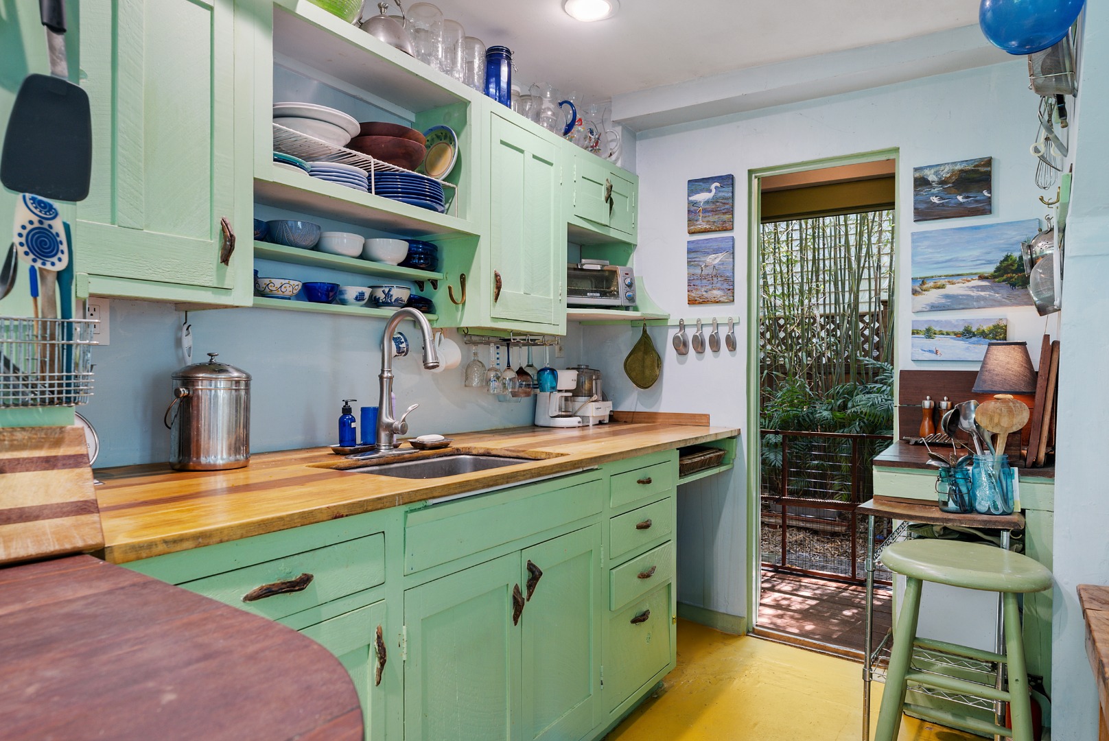 129 Beach Road Vineyard Haven, MA 02568 - Photo 26 of 71 a kitchen filled with stainless steel appliances granite countertop a sink dishwasher stove and cabinets
