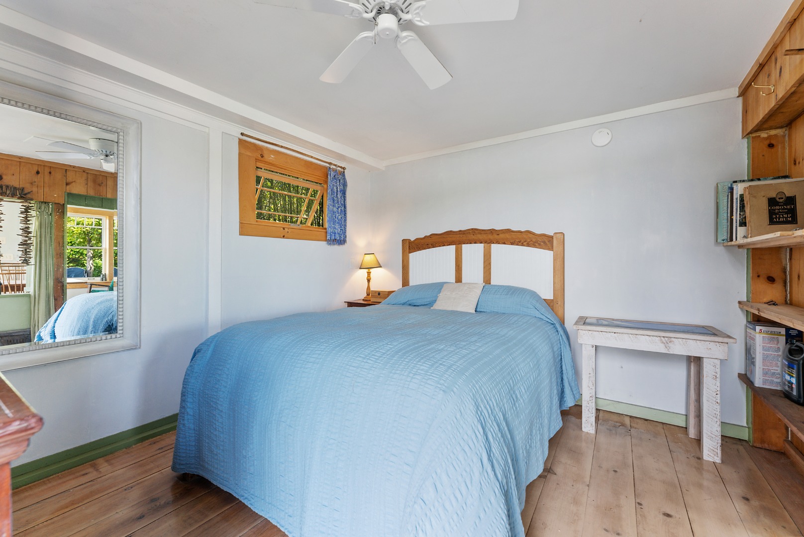 129 Beach Road Vineyard Haven, MA 02568 - Photo 27 of 71 a bedroom with a bed and a table in it