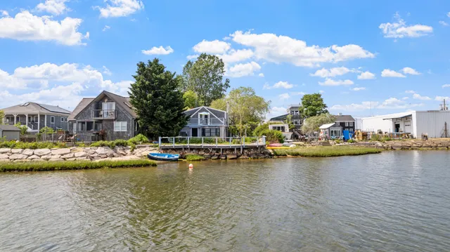 a front view of a house with swimming pool